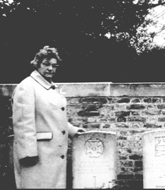 AT Batchelor Nan Hughes Stood by Grave 002